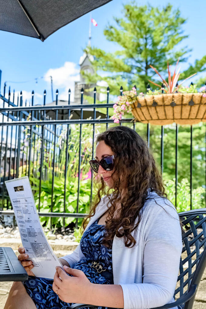 author looking at cafe menu